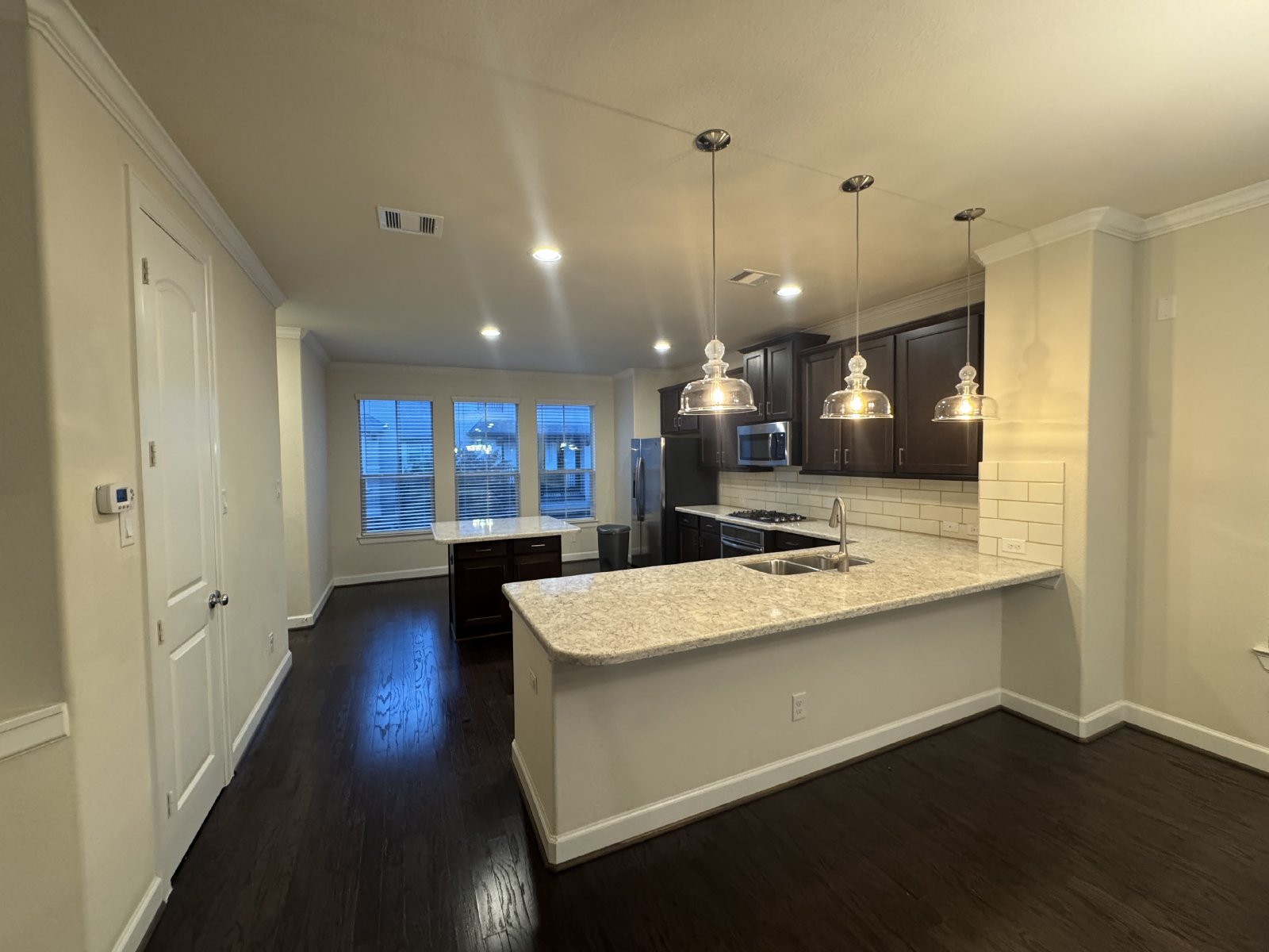 Welcome to 1506 Brayson — a stunning 3-story home perfectly situated in the heart of Spring Branch! property image