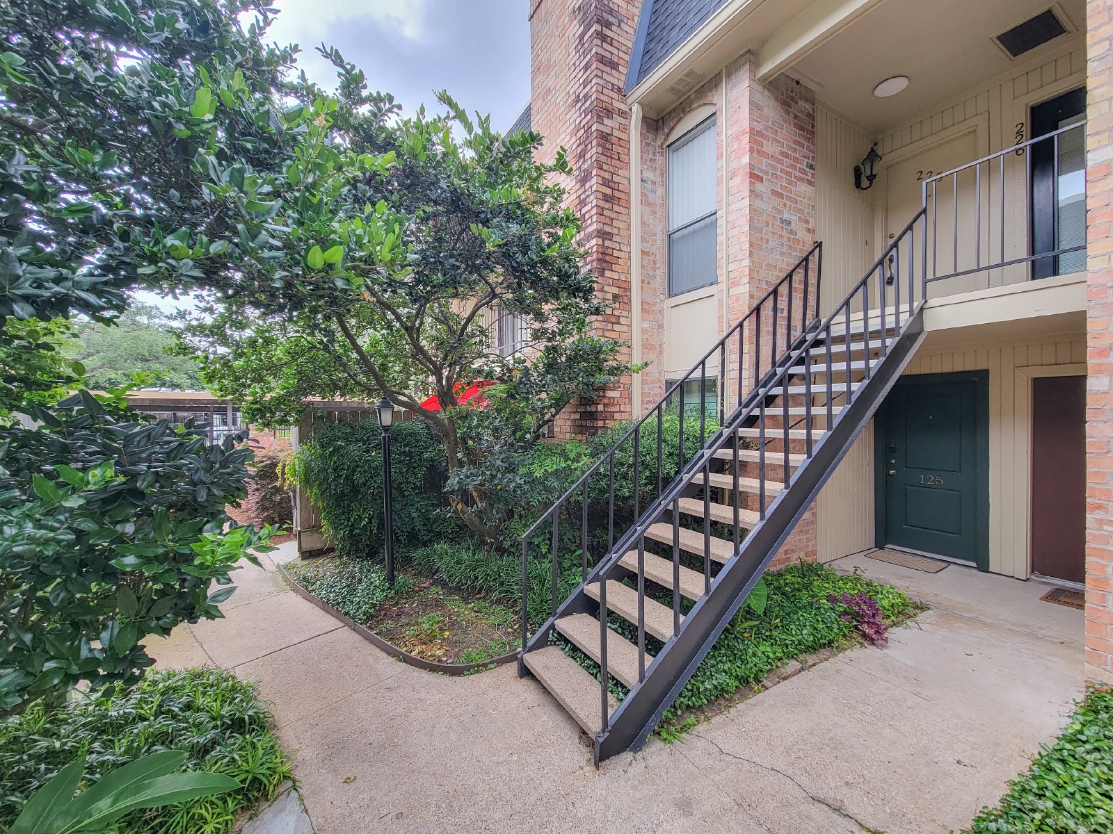 Luxury River Oaks Corner Condo with 24/7 Security & Walkable Location property image